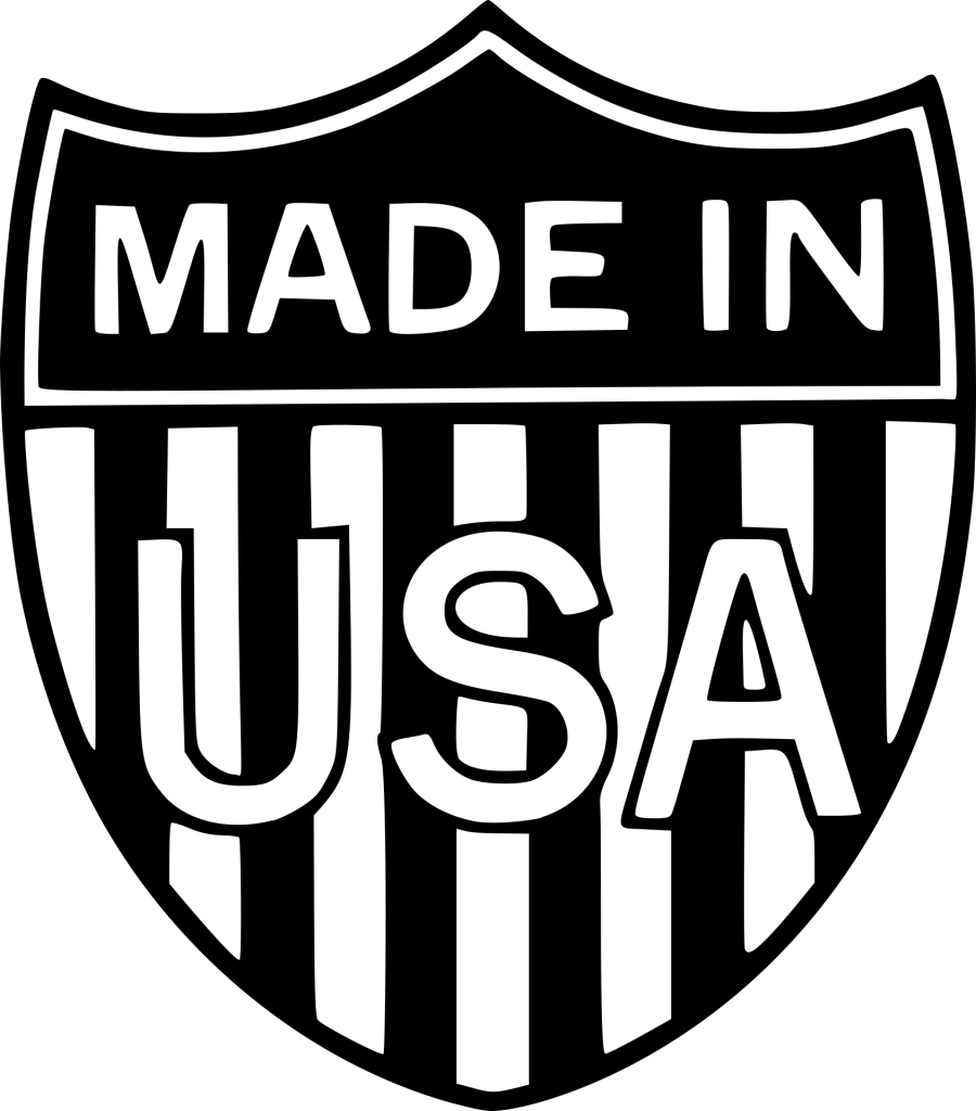 A black and white shield emblem featuring the text 'MADE IN' at the top and 'USA' prominently displayed in the center with vertical stripes.